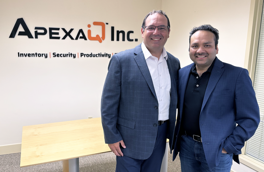 Bryan Champagne, Eclypses CEO (right) and Lokesh Aggarwal, Apexa iQ CEO (right) at the Apexa iQ headquarters in Massachusetts. 